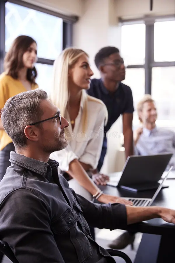 creative-business-team-listening-brainstorm-meeting-close-up-vertical-153628866